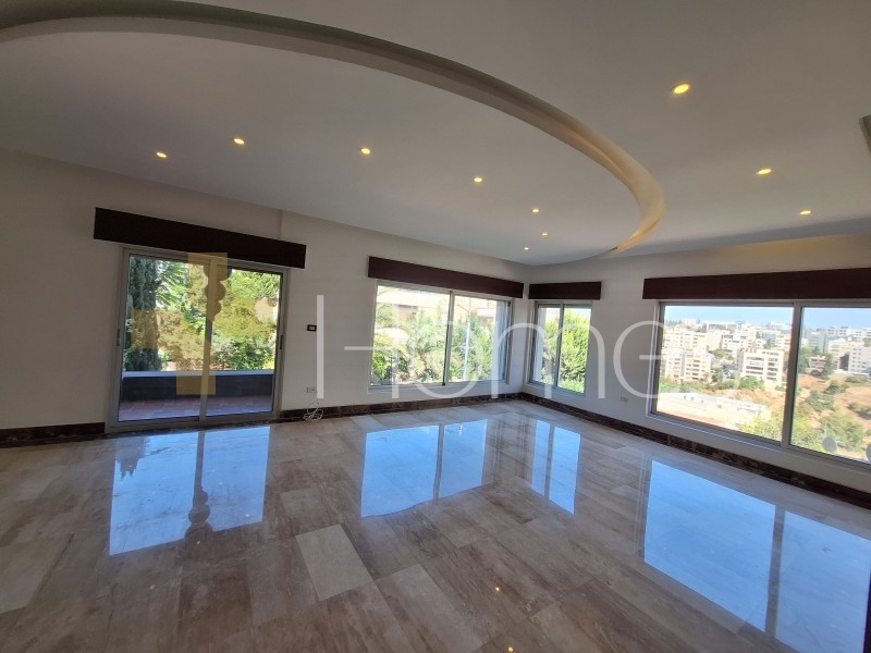 Attached villa for rent in Abdoun with a building area of 334m