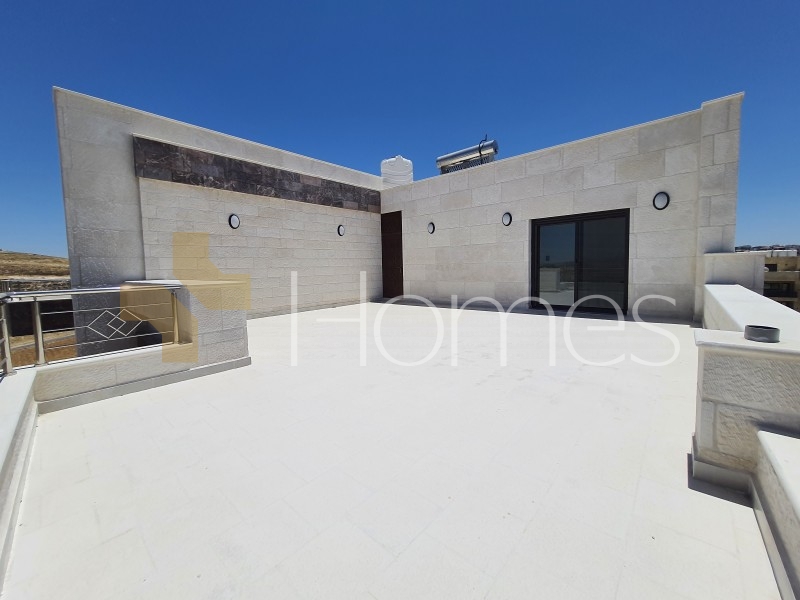 Last floor with roof for sale in Qaryet Al Nakheel total area of 240m