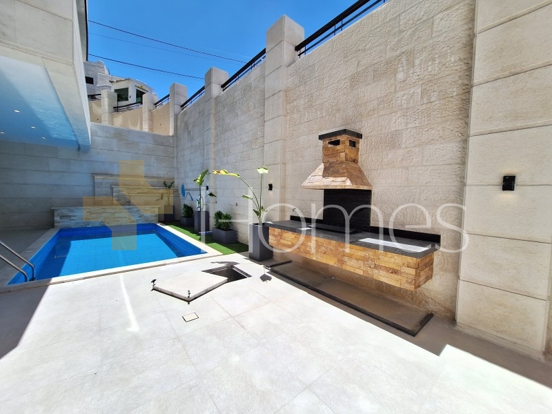 Flat floor apartment with pool and garden for sale in Abdoun 355m