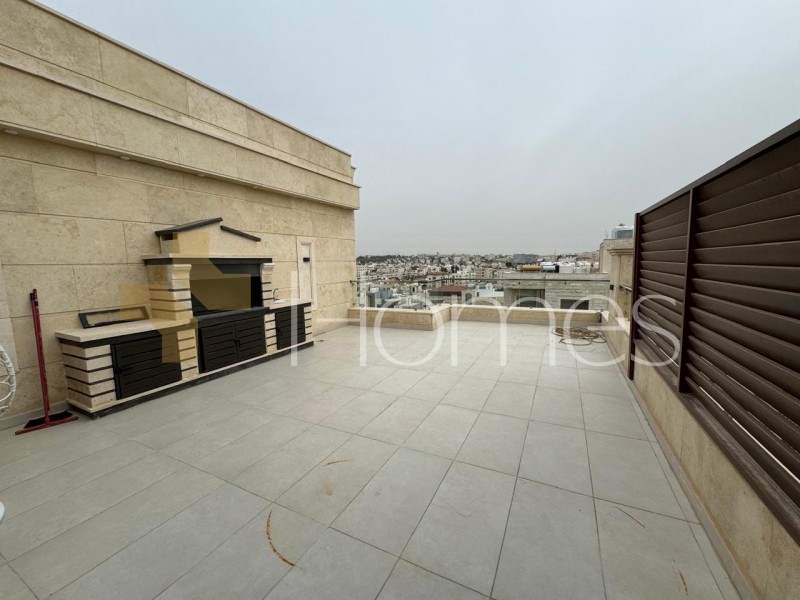 Furnished last floor with roof for sale in Al Thuhair total area 244m