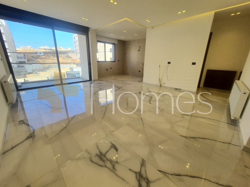 First floor for sale in Hai Al Sahaba with a building area of 130m