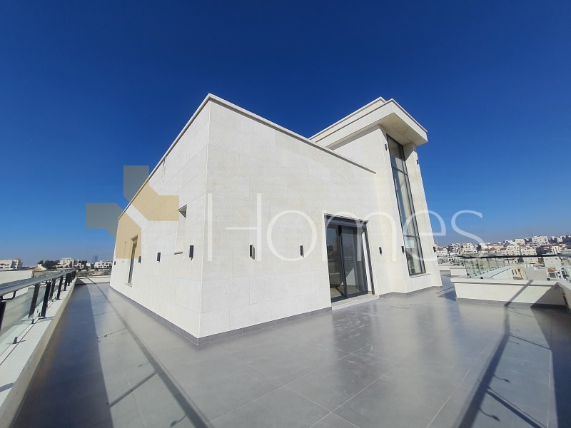 Flat roof with high view for sale in Rujm Omaish, building area of 225m