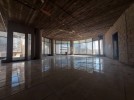 Unfinished office with glass facades for rent in Wadi Saqra, of 400m