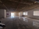 Unfinished office with glass facades for rent in Wadi Saqra, of 400m