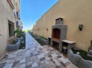 Duplex apartment with a garden for rent in Al Fuhais 400m