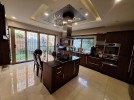 Furnished attached villa for rent in Abdoun with a land area of 250m