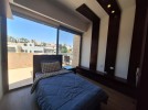 Roof with terrace within a compound for rent in Abdoun 100m