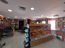 Flat commercial showroom with attic for rent in Khalda area of 450m