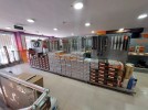 Flat commercial showroom with attic for rent in Khalda area of 450m