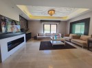 Furnished apartment with garden for rent in Rujm Omaish area of 335m