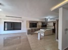 Flat apartment with a garden for rent in Dair Ghbar 341m