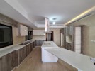 Flat apartment with a garden for rent in Dair Ghbar 341m