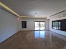 Flat apartment with a garden for rent in Dair Ghbar 341m