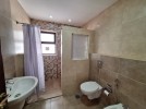 Flat apartment with a garden for rent in Dair Ghbar 341m