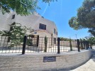 Attached villa for rent in Abdoun area with a building area of 280m