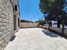 Attached villa for rent in Abdoun area with a building area of 280m