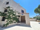 Attached villa for rent in Abdoun area with a building area of 280m