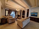 Furnished villa for rent in Abdoun with a building area of 1000m