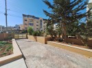 Ground floor apartment with garden for rent in Khalda 400m