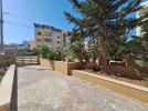 Ground floor apartment with garden for rent in Khalda 400m