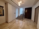 Attached villa for rent in Abdoun with a building area of 334m