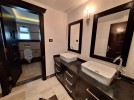 Attached villa for rent in Abdoun with a building area of 334m