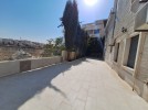 Attached villa for rent in Abdoun with a building area of 850m