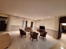 Attached villa for rent in Abdoun with a building area of 850m