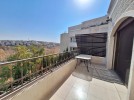 Attached villa for rent in Abdoun with a building area of 850m