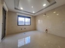 Ground floor with a garden for sale in Marj El-Hamam, area of 180m