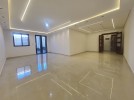 Apartment with garden for sale in Qaryet Al Nakheel, area of 200m