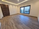 Apartment with garden for sale in Qaryet Al Nakheel, area of 200m