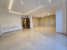 Apartment with garden for sale in Qaryet Al Nakheel, area of 200m