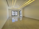 First floor apartment for sale in Qaryet Al Nakheel, an area of 200m