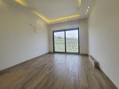 Ground floor with terrace for sale in Al Thuhair, building area 165m