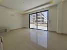 Ground floor with terrace for sale in Al Thuhair, building area 165m