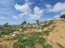 Land for building a private villa for sale in Al Bassa, an area 1216m