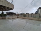 Flat ground floor with a terrace for sale in Dair Ghbar 221m