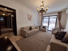 Apartment with garden for sale in Um Al-Summaq 187m