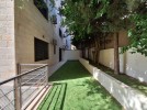 Apartment with garden for sale in Um Al-Summaq 187m