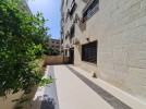 Apartment with garden for sale in Um Al-Summaq 187m