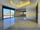 Ground floor with pool for sale in Qaryet Al Nakheel with area 200m