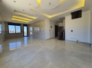 Last floor with roof for sale in Qaryet Al Nakheel total area of 240m