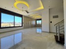 Last floor with roof for sale in Qaryet Al Nakheel total area of 240m