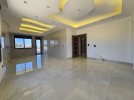 Third floor apartment for sale in Qaryet Al Nakheel an area of 200m