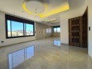 Third floor apartment for sale in Qaryet Al Nakheel an area of 200m