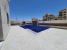 Ground floor with pool for sale in Qaryet Al Nakheel an area 200m