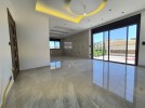 Ground floor with pool for sale in Qaryet Al Nakheel an area 200m