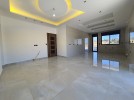 Ground floor with pool for sale in Qaryet Al Nakheel an area 200m