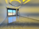 Ground floor with pool for sale in Qaryet Al Nakheel an area 200m